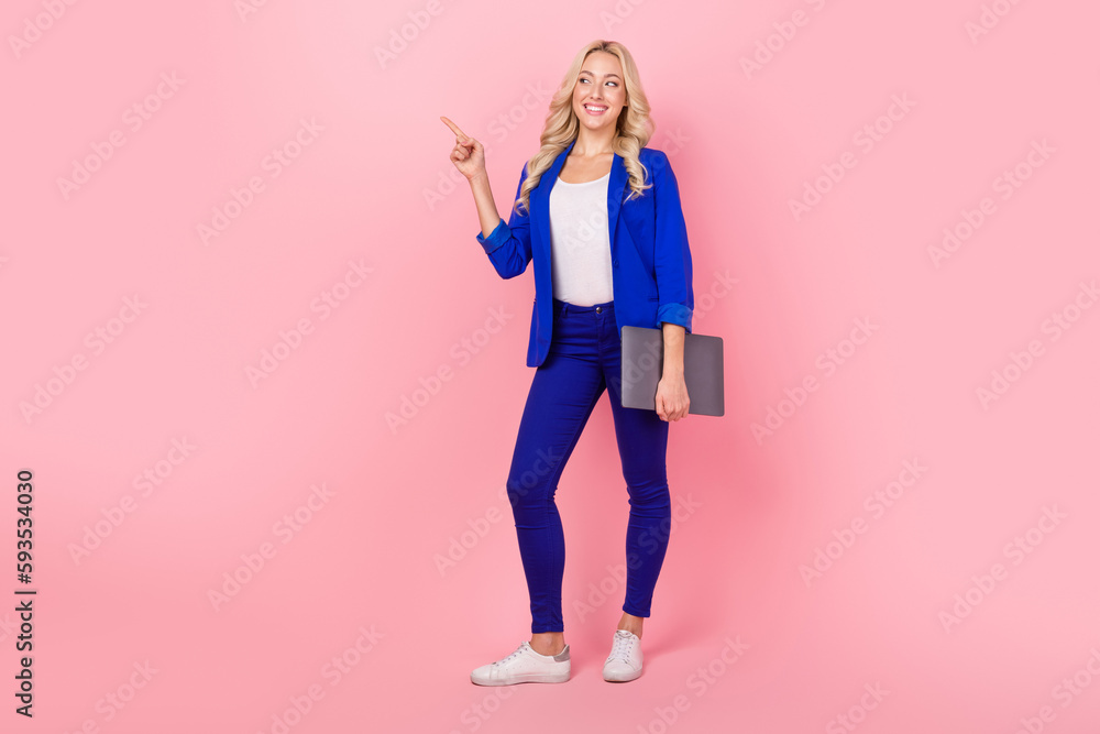 Poster full length photo of business lady hold netbook laptop direct finger empty space smart casual outfit