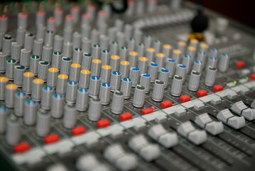 Fototapeta premium Closeup of colorful mixer knobs and sliders