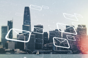 Abstract virtual postal envelopes hologram on San Francisco cityscape background, email and notification concept. Multiexposure