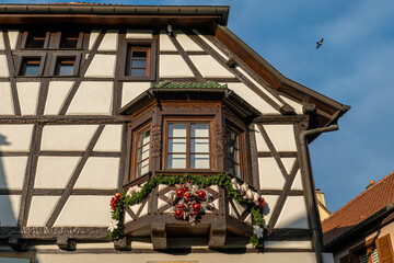 Fototapeta na wymiar Eguisheim, Alsace, France - December 6, 2022: Traditional house in the old village