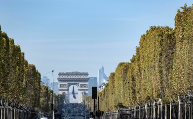 Champs Elysees avenue heading to the Arc de Triomphe in Paris, France.