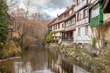 Fototapeta na wymiar Kaysersberg; Alsace, France - December 7, 2022: Medieval houses by the river