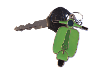 PNG mobile scooter key with a green metal scooter icon hanger attached to the keys with a metal ring. PNG image