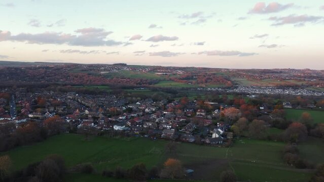 Rising Establishing Aerial Drone Shot Over Calverley Village Houses and Fields at Autumn Sunset in West Yorkshire UK