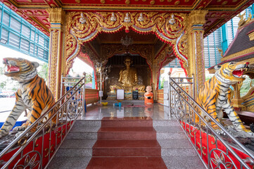 Fototapeta na wymiar Chonburi, March 12, 2023. Wat Huay Yai, Buddhist temple popular for merit making ceremonies, with ornate shrines, gilded statues & stupas.