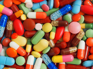 colorful pills on white background