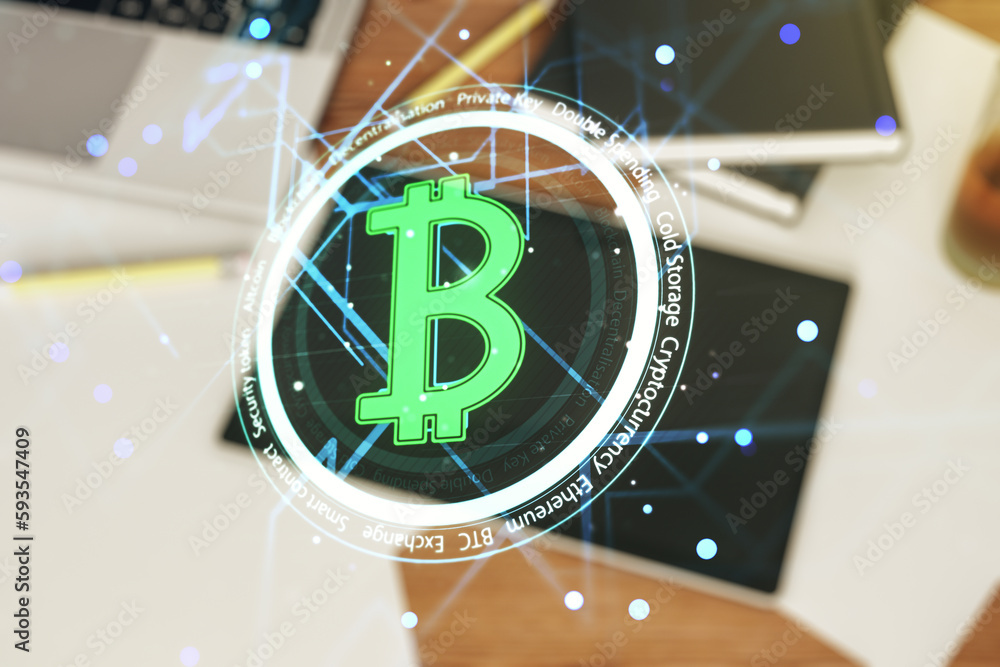 Poster creative bitcoin concept and modern digital tablet on desktop on background, top view. double exposu