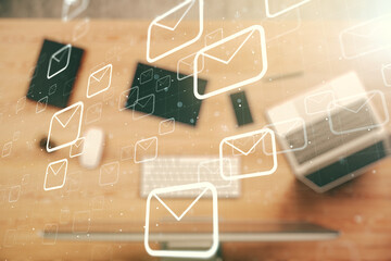 Creative abstract postal envelopes sketch on modern laptop background, e-mail and marketing concept. Double exposure