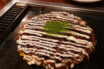 Okonomiyaki in Osaka, Japan - 大阪 名物 お好み焼き