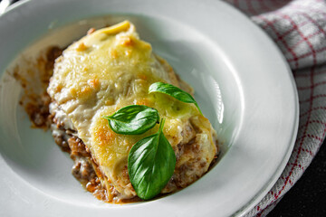lasagna classic dish bechamel sauce, minced meat, grated cheese healthy meal food snack on the table copy space food background rustic top view