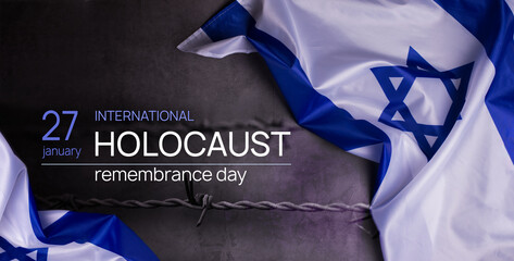Holocaust Remembrance Day. Yom HaShoah. Official flag of Israel on a grey background in composition with barbed wire. Memorial Day for Jewish people.