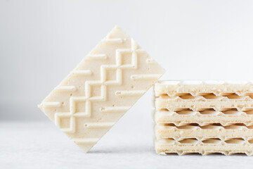 Vanilla wafers on a marble plate, wafer cookies filled with vanilla cream
