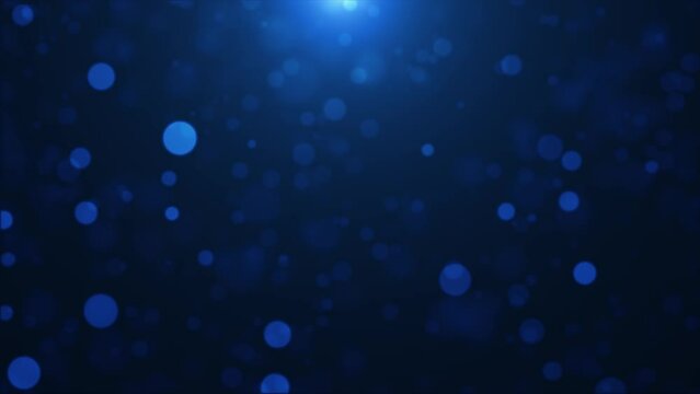 Abstract background of blue glowing particles and bokeh dots of festive energy magic, video 4k, 60 fps