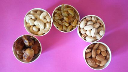 Mix of dried fruits and nuts for backgrounds and textures, Copy Space. Top view.