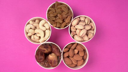 Mix of dried fruits and nuts for backgrounds and textures, Copy Space. Top view.