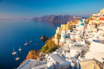 Famous Panoramic view of Santorini, Greece. White architecture, yachts and the blue sea of the...