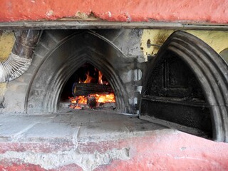 Traditional stone oven for bread baking at Italian farmhouse.