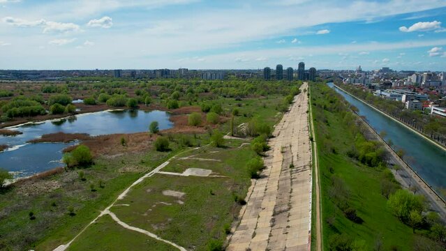 Drone Side Movement Over The Dambovita River In Bucharest Romania, Vacaresti Delta