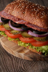 photo of a sausage and vegetable sandwich