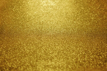 gold abstract sparkle glitter background with golden backdrop texture. 