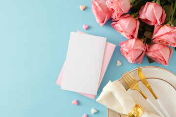 Festive setting concept for Mother's Day. Top view photo of plate with cutlery fabric napkin postcard bunch of pink roses and small hearts on isolated pastel blue background with empty space