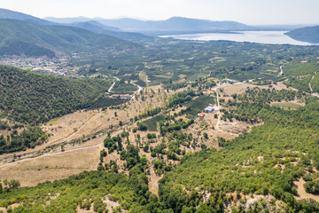 Fototapeta premium Meandering serpentine road in the mountain. Aerial view. Copter, drone view