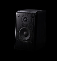 Black audio monitor in a black background. Attractive and modern design, music and tech enthusiasts...