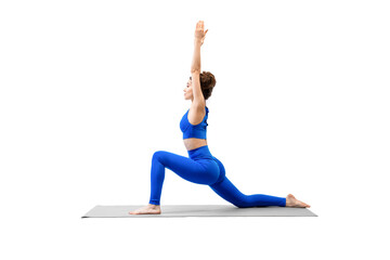 Attractive young woman practice deep static lunge exercise with raised hands, isolated on white.