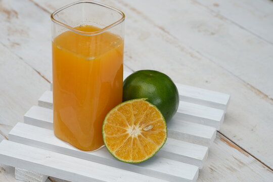 Orange juice. made from fresh squeezed oranges. tangerine. fresh fruit drink without preservatives, a source of natural vitamin C and antioxidants. served in clear glass. citrus nobilis. 