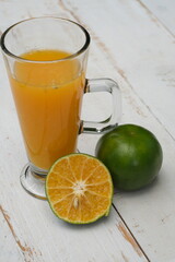 Orange juice. made from fresh squeezed oranges. tangerine. fresh fruit drink without preservatives, a source of natural vitamin C and antioxidants. served in clear glass. citrus nobilis. 