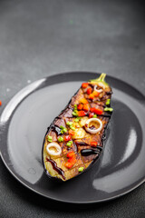 eggplant salad fried with vegetables healthy meal food snack on the table copy space food background rustic top view keto or paleo diet veggie vegan or vegetarian food