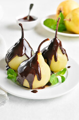 Poached pears with chocolate sauce