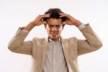 Image of tired businessman having headache.