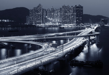 Night scenery of traffic on Tseung Kwan O Cross Bay Link in Hong Kong city