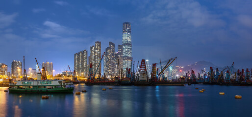 Fototapeta na wymiar Night scenery of skyscraper, skyline and harbor of Hong Kong city
