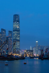 Fototapeta premium Night scenery of skyscraper, skyline and harbor of Hong Kong city