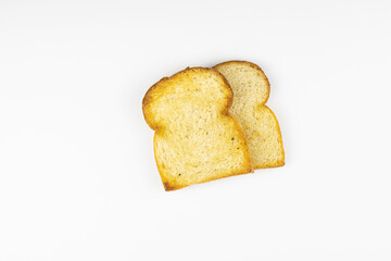 Two toasted slices of bread in isolation on a white background. Top view.