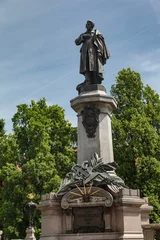 Fotobehang Historisch gebouw Closeup view of the monument of Adam Mickiewicz in Warsaw