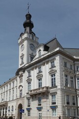 Fototapeta na wymiar Closeup view of the beautiful Jablonowski Palace with a clock tower in Warsaw