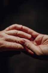 Close up of wrinkled hands, copy space.