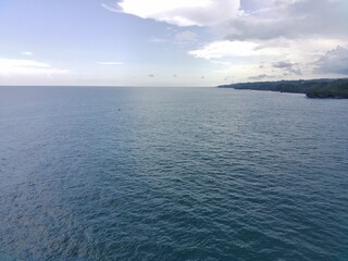 Aerial view of ships in the clear blue sea
