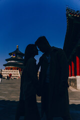 beautiful couple in love exploring China on their honeymoon
