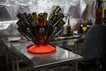 Fototapeta na wymiar winery industrial. Wine bottles weigh and dry