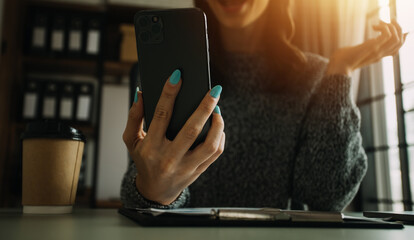 Financial analysts analyze business financial reports on a digital tablet planning investment project during a discussion at a meeting of corporate showing the results of their successful teamwork.