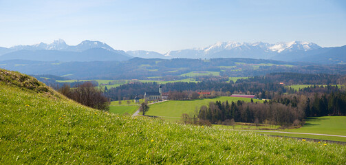 view to Wilparting pilgrimage church and bavarian alps, from Irschenberg hill