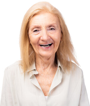 Happy senior woman portrait Beautiful elderly lady enjoying life Happy Retired female laughing look at camera with smiling face standing over grey background copy space Insurance Health care concept