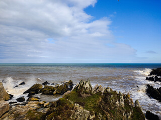 Fototapeta na wymiar Irish coast with blue sky