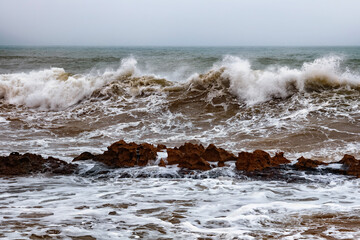 View of the stormy Atlantic Ocean coast in the area of Essaouira in Morocco.