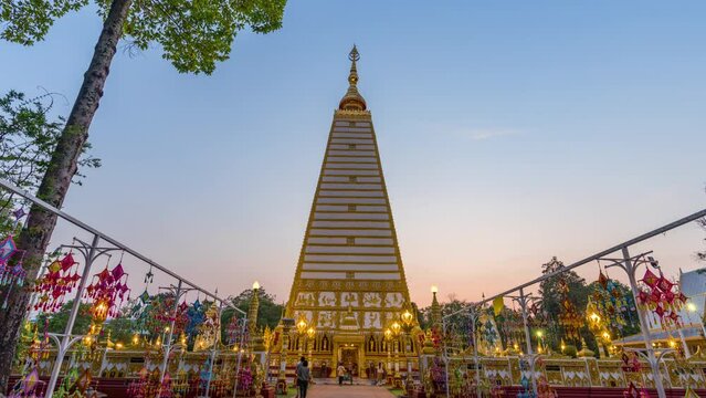 Time lapse - scenes of sunset at Wat Phrathat Nong Bua temple in Ubon Ratchathani province, Thailand.
