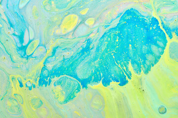 Fototapeta na wymiar Abstract creative background liquid art, paint stains and blots, blue yellow alcohol ink, multicolored marble texture